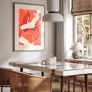 Red and white Japanese cranes in flight illustrated in a traditional Asian art style on a vibrant red background. Framed or unframed wall art.
