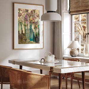 ramed vintage flower wall art print displayed in a cozy interior setting, reproduced from Frederick Judd Waugh’s 1922 Rum Row floral still life. The botanical artwork features classic early twentieth-century style with natural colors and refined detail, ideal for cottagecore, traditional, or antique-inspired home decor.