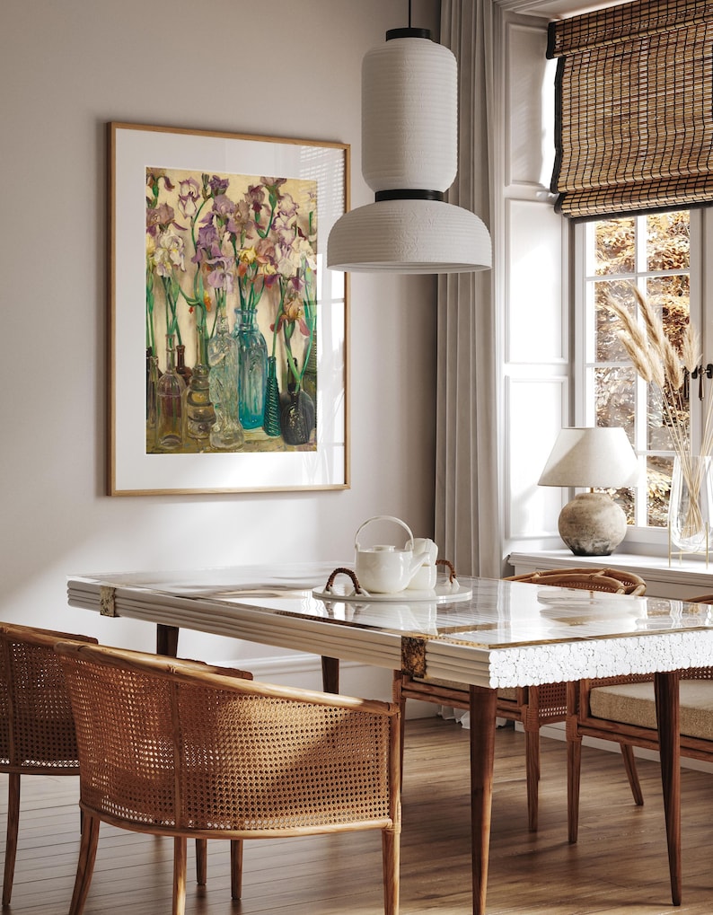 ramed vintage flower wall art print displayed in a cozy interior setting, reproduced from Frederick Judd Waugh’s 1922 Rum Row floral still life. The botanical artwork features classic early twentieth-century style with natural colors and refined detail, ideal for cottagecore, traditional, or antique-inspired home decor.
