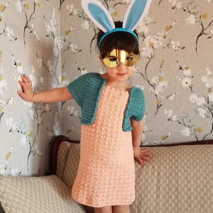 Handmade Crochet Dress Size 5.  Adorable salmon dress and with faux teal bolero. Popular puff texture adds soft detail on this mod outfit.