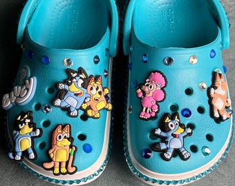 Custom crocs, bluey inspired, bedazzled shoes with croc charms and rhinestones.