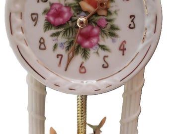 Beautiful Vintage Clock from the 2000s Porcelain Table clock hummingbirds, flowers, and glass Dome fabulous piece for antique collectors