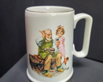Norman Rockwell Museum  The Cobbler  Coffee Tea Mug Cup White w/ Gold Rim Vintage 1982  Coffee Tea Mugs Cup