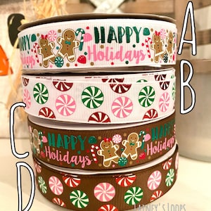 May include: Four rolls of Christmas ribbon with different designs. The top ribbon is white with gingerbread men and the text "Happy Holidays". The second ribbon is white with pink and green peppermint swirls. The third ribbon is brown with gingerbread men and the text "Happy Holidays". The bottom ribbon is brown with pink and green peppermint swirls. The text "Lainey's Loops" is printed on the bottom ribbon.
