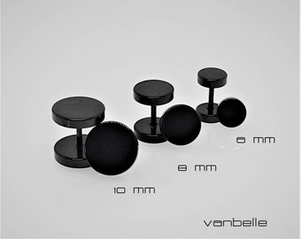 May include: Three black stainless steel ear gauges in different sizes: 6 mm, 8 mm, and 10 mm. The gauges are round and have a smooth finish.