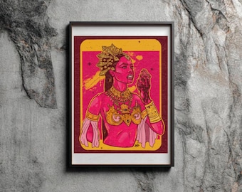 May include: A framed art print featuring a stylized illustration of a figure with pink skin, wearing an ornate gold crown, layered necklaces, and a decorative chest piece. The figure holds a small object, set against a vibrant yellow and maroon background.
