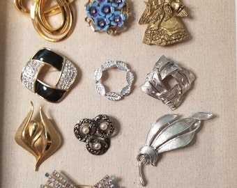 Lote de 10 broches vintage de Avon, Butler, Garry's, Continental, España, nº 9904, Lisner
