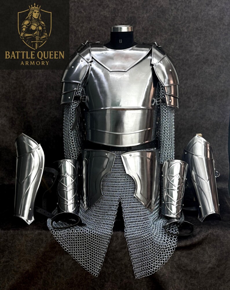 May include: A full set of polished steel armor, including a breastplate, shoulder guards, arm guards, and leg protection, displayed on a mannequin. Chainmail is integrated into the design. The logo "BATTLE QUEEN ARMORY" is visible.
