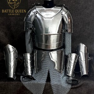 May include: A full set of polished steel armor, including a breastplate, chainmail, and arm guards. The armor is displayed on a mannequin, with the Battle Queen Armory logo visible in the upper left corner.