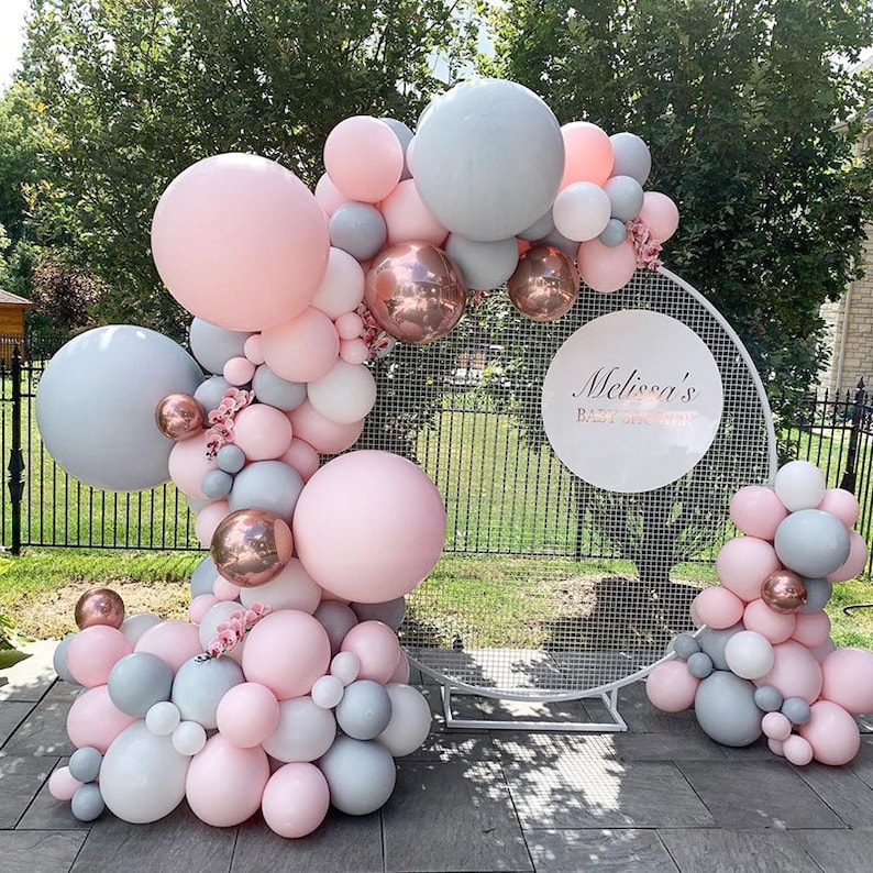 pink and grey balloon arch