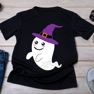 May include: Black t-shirt with a white ghost wearing a purple witch hat with an orange buckle. The ghost has a smiling face with two large eyes.