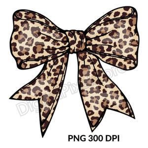 May include: A large brown and tan leopard print bow. The bow is tied in a knot and the ends are curled.