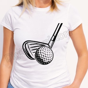 May include: Black and white graphic of a golf club and golf ball. The golf club is positioned above the ball, ready to strike. The ball has a dimpled surface. The design is on a white t-shirt.