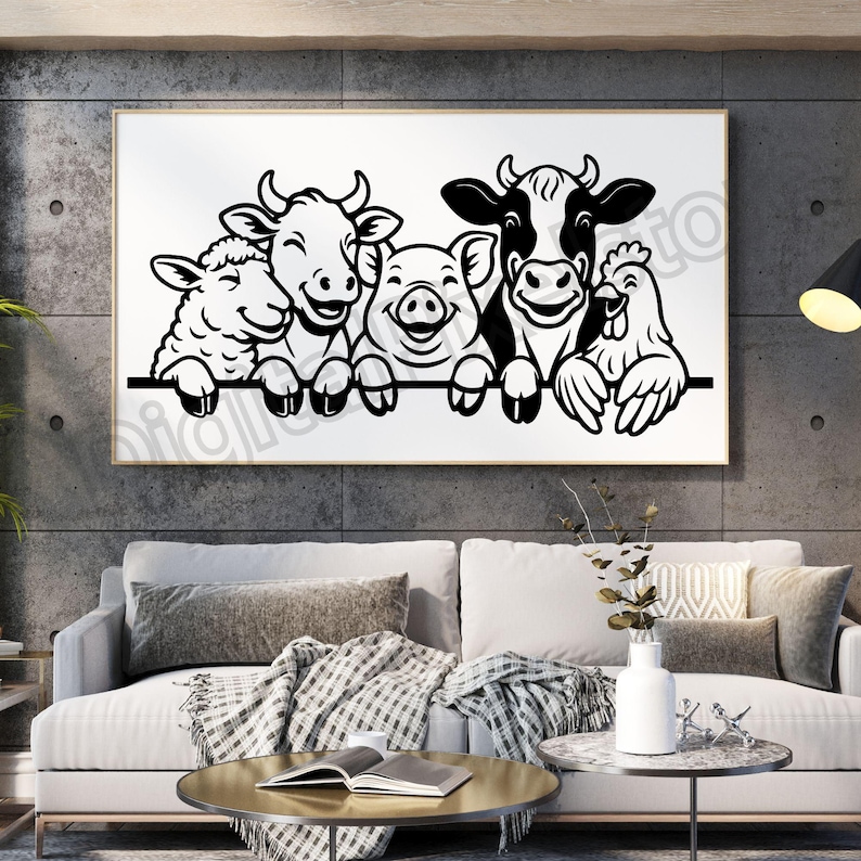 May include: A framed black and white artwork depicting a sheep, cow, pig, cow, and chicken. The farm animals are smiling and peeking over a black line. The artwork is displayed above a white sofa with grey cushions.