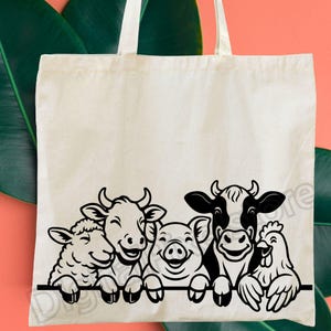 May include: A cream-coloured tote bag with a black and white illustration of farm animals: a sheep, cow, pig, cow, and chicken. The animals are smiling and peeking over a black line. The bag has white handles.
