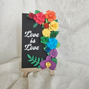 Handmade paper flower, Pride piece with a beautiful quote decorated in rainbow flowers.