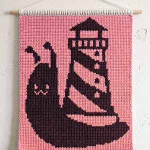 Follow The Light tapestry crochet pattern – Snail lighthouse knit wall hanging PDF