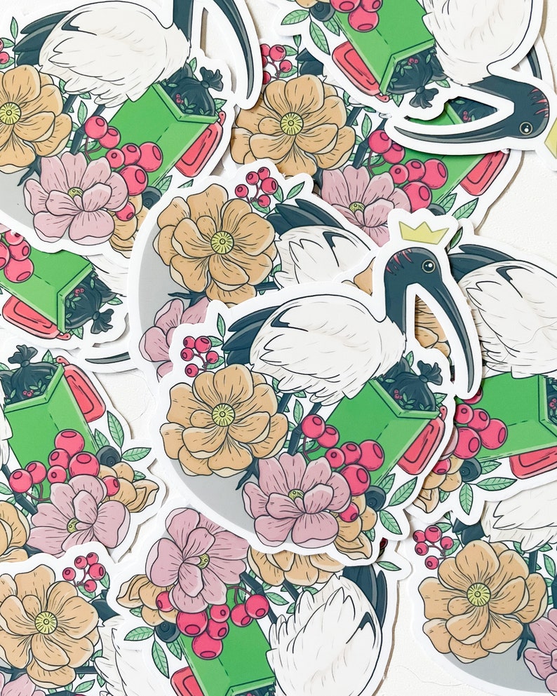 May include: A set of stickers featuring white ibises with green recycling bins and red berries. The ibises are depicted with a crown and are surrounded by flowers.