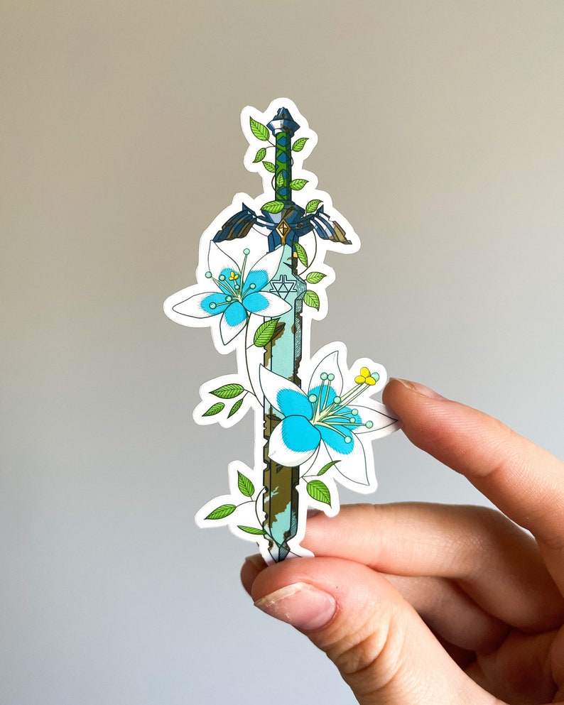 May include: A sticker featuring a stylized sword with a blue and white flower design. The sword is surrounded by green vines and leaves.