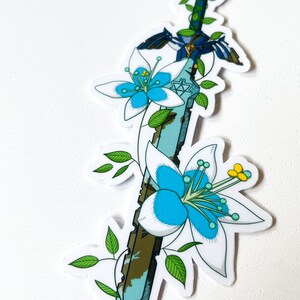 May include: A blue and green sword with a white and blue flower design. The sword is surrounded by green vines and leaves.