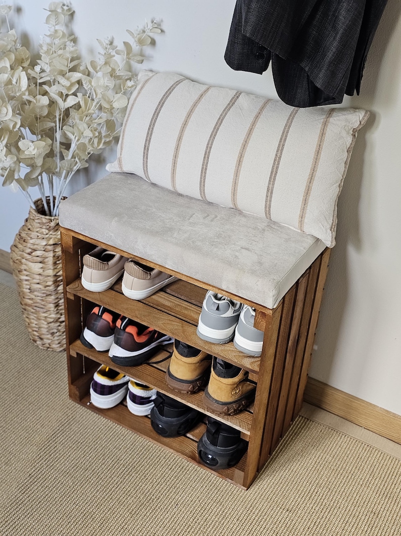 Hallway shoe bench with cushion and wooden crate storage underneath