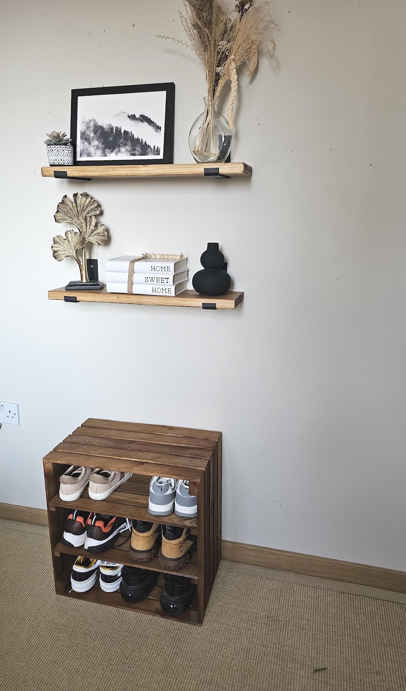 Wooden crate shoe rack showing sturdy construction and fixed shelves