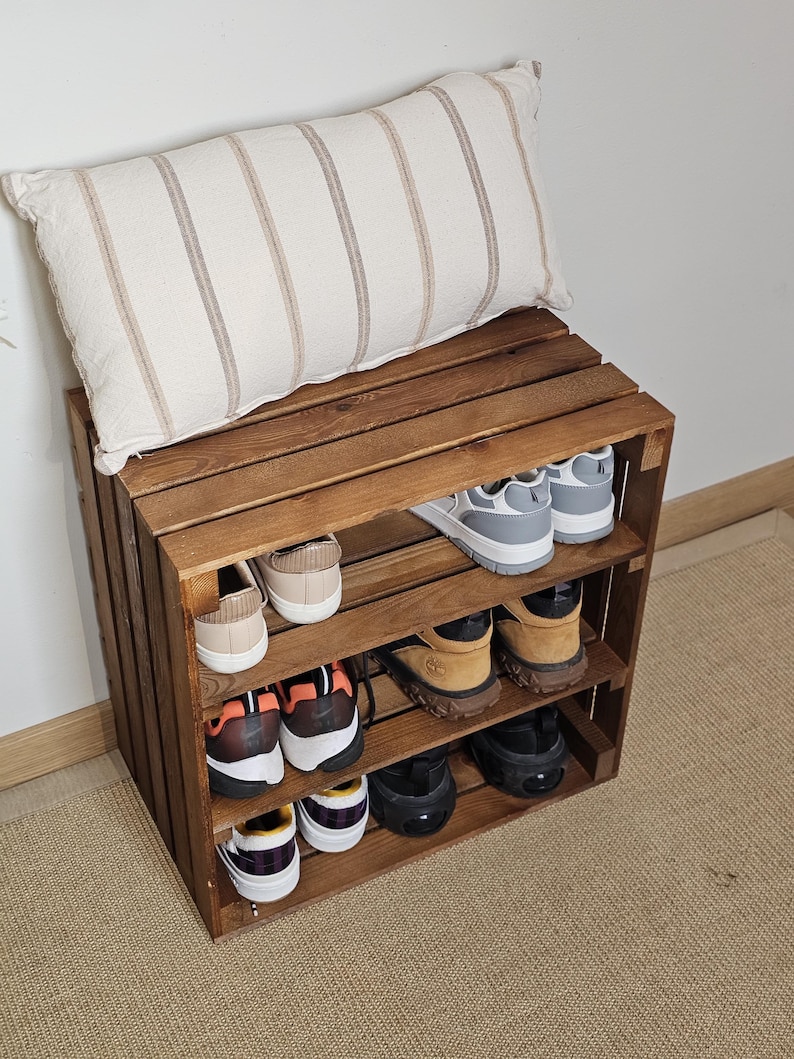 Solid pine slatted wood detail on rustic 3-tier wooden crate shoe storage unit.