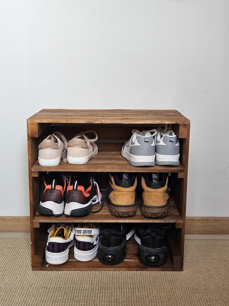 Rustic wooden shoe rack and storage bench used in hallway for shoes, boots, and home organisation – handcrafted solid wood furniture.