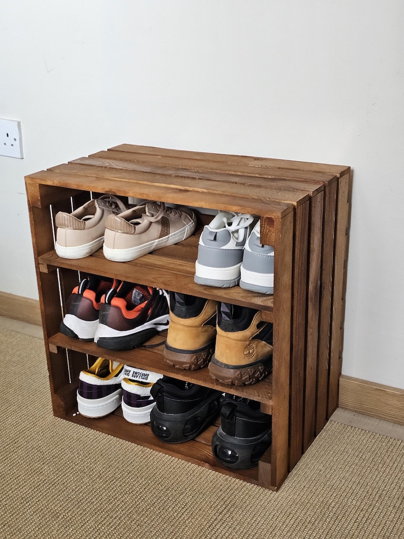 Wooden shoe rack bench with optional upholstered cushion in hallway setting