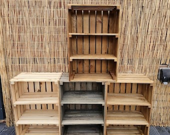 May include: Three wooden shelves made from repurposed crates. The shelves are stacked on top of each other and have a rustic, farmhouse style.