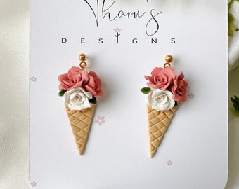 IJshoornoorbellen met bloemen: handgemaakte sieraden van polymeerklei