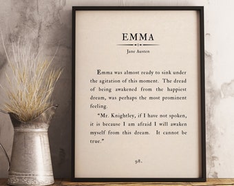 May include: A framed print of a passage from Jane Austen's novel "Emma". The passage is printed in black text on a cream background. The frame is black and has a white mat.