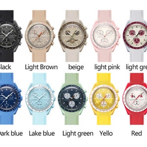 May include: Ten different colored wristwatches with chronograph features. The watches have a white face with black markings and a black, brown, beige, pink, gray, blue, light blue, green, yellow, or red silicone band.