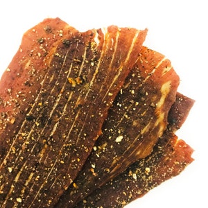 Cracked Peppercorn • Beef Jerky Chips • Addictive • Bold Flavor • Crunchy