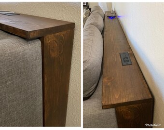 narrow console table behind couch