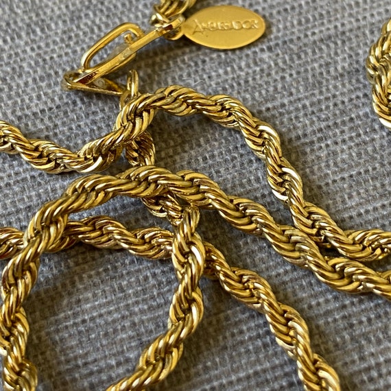 Rope chain necklace marked Ambassador Korea, Gold ton… Gem