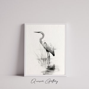 May include: Black and white watercolor painting of a great egret standing in shallow water with reeds in the background. The bird is facing to the left and its reflection is visible in the water.