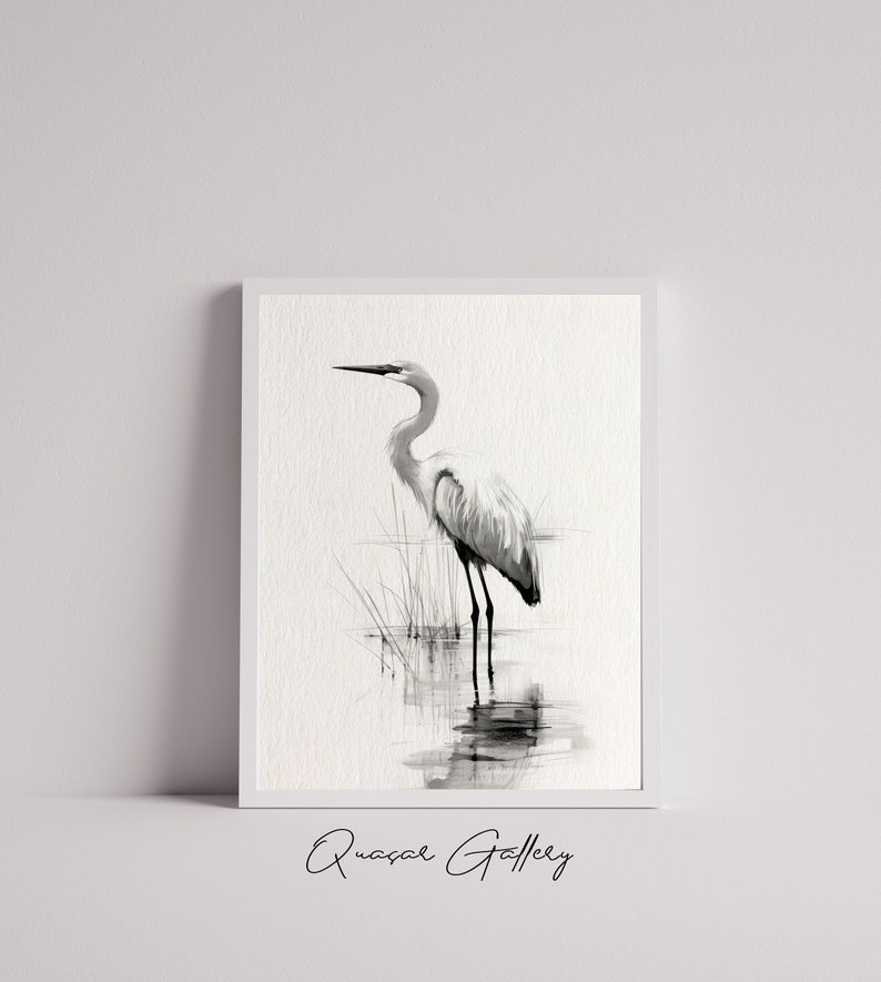 May include: Black and white watercolor painting of a great egret standing in shallow water with reeds in the background. The bird is facing to the left and its reflection is visible in the water.