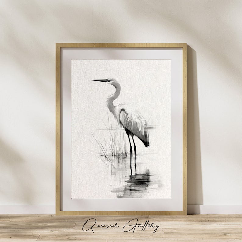 May include: A black and white watercolor painting of a heron standing in a marsh. The heron is facing to the left and has its head tilted down. The background is a simple white.