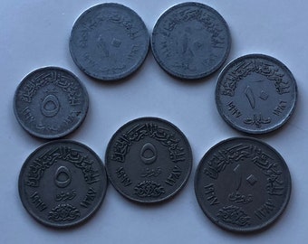 1967 Egyptian Coins Set of Seven (7): 5 Milliemes, 10 Milliemes, 10 Milliemes, 10 Milliemes, 5 Piastres, 5 Piastres, 10 Piastres