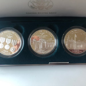1994 U.S. Veterans Commemorative Silver Dollars; United States Mint 3 Coin Set with Cases and Certificate of Authenticity