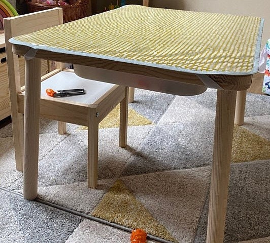 Oilcloth fitted Spotty Ochre Table Mat with elastic fastenings to fit Ikea Flisat Sensory Table. Custom sizes made to order