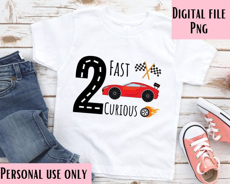 May include: White t-shirt with a black number 2, a red race car, and the text "Fast & Curious".