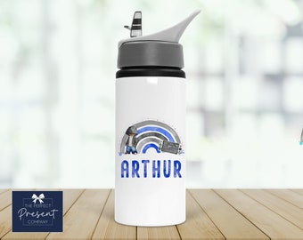 May include: White water bottle with a gray lid and a blue and gray design. The design includes a rainbow, a cartoon figure, and the name "ARTHUR" in blue letters. The bottle has a flip-top spout.