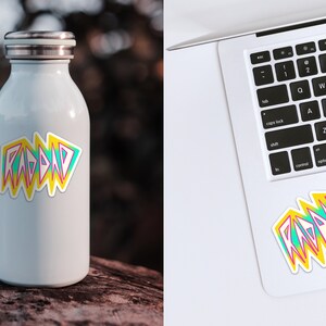 May include: A white stainless steel water bottle with a colorful "RAD DAD" sticker on the side. The sticker is in a retro 80s style with pink, blue, and yellow colors.