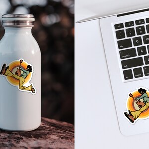 May include: A sticker featuring a retro illustration of a person playing a guitar with a colorful background.
