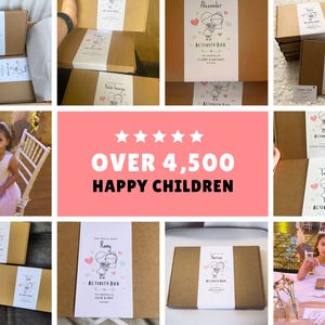 May include: A collection of brown cardboard activity boxes featuring white paper bands with a cartoon illustration of a couple, pink hearts, and the text Activity Box. The boxes are shown in various settings, including at a wedding event.