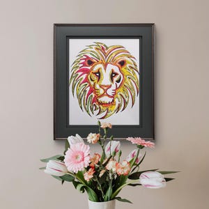 May include: A framed print of a colorful lion's head with a yellow, red, and green color scheme. The lion's mane is made up of intricate patterns and swirls.