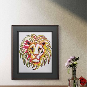 May include: A framed print of a colorful lion's head with yellow, red, and green lines. The lion's head is stylized and has a white background.