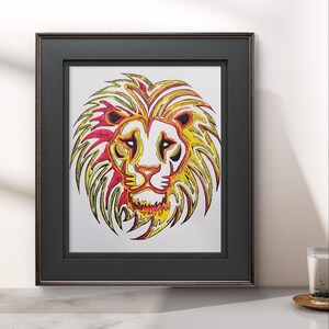 May include: A framed illustration of a lion's head with a colorful, abstract design. The lion's mane is a mix of yellow, red, and green.